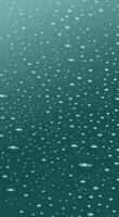 Water drops on dark teal color vertical background photo