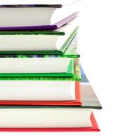 multicolored books stack isolated photo