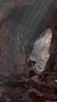 A majestic cave illuminated by beams of sunlight video