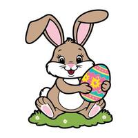 Easter bunny holding an easter egg vector