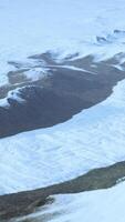 Snow-covered mountains and lakes from a bird's eye view video