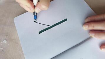 A stepbystep guide to precision calligraphy demonstrating stylistic pen movements on paper. video
