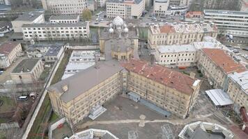 Vilnius, Lithuania 25th november, 2024 - aerial view Lukiskes Prison .The Prison complex survived both World Wars and the Soviet occupation. Historical landmark popular tourist attraction video