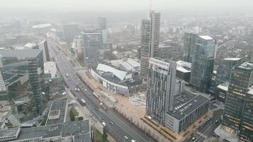 Vilnius, Lithuania - 28th november, 2024 - aerial view The Central Business District panorama with city traffic. Developing business district in snipiskes eldership of Vilnius, Lithuania video