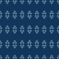 Blue color background ethnic pattern pixel motif cross stitch with fabric pattern pixel. vector