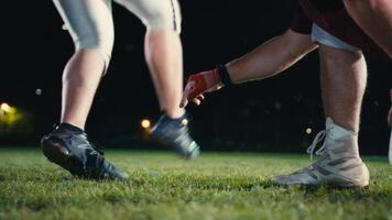 Cinematic shot of American Football player Kickoff Game Start. Static Close-up of Ball Being Kicked by the Professional Player. Gates Goal Kick. Successful Team Scores and Wins Championship. video