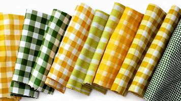 A set of yellow and green gingham fabric featuring patterns. video