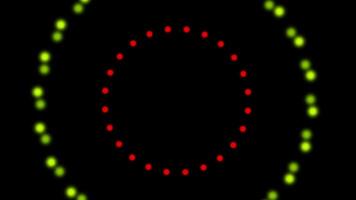 a circle with red and green dots on it video