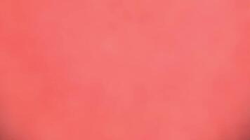 a red background with a pink background video