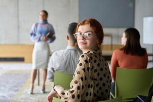 A diverse group of business professionals sits attentively in a modern office, actively participating in a training session led by an instructor, focusing on the latest technological advancements in photo