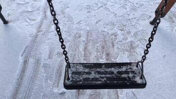 empty swing swinging winter snow video