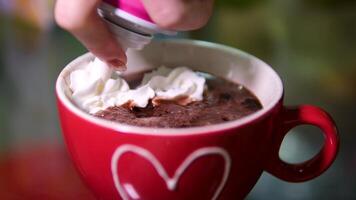 cocoa with cream Putting stick cookies in coffee with whipping cream video