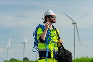 Wind turbine engineers focus on plan review work. in further maintenance. photo