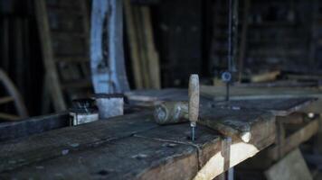Old carpentry workshop featuring vintage tools in use during daylight hours video