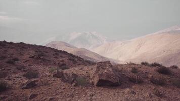 Expansive landscape of the Pamir Mountains in Tajikistan under soft sunlight video
