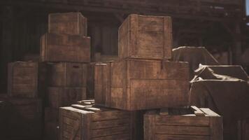 Wooden crates stacked in a rustic warehouse during daylight hours video
