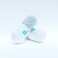 Vitamin B5 With White, Turqoise Capsule, Granules and Whtie Background photo
