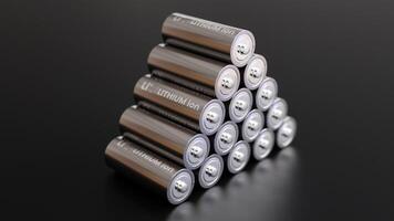 A pile of Lithium Ion batteries with dark background photo