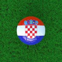 Flag Of Croatia On Soccer Ball With Grass Background photo