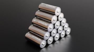 A pile of Lithium batteries with dark background photo