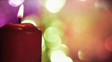 Sweet Romantic Candle Light and Colorful Bokeh Behind photo