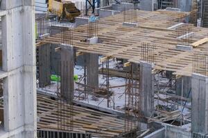 Construction workers working on Construction machine. Aerial platform for workers who work at height on buildings. photo