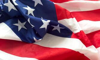 Natural fabric crumpled USA flag, rag American flag top view as texture or background, high resolution picture photo