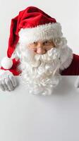 Santa Claus with Blank White Sign. Concept of Christmas, Holidays, Festive Season, and Blank Card for Custom Message. Vertical. Greeting card, postcard, mockup, invitation, letter. Copy space photo