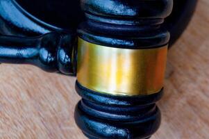 Top view of lawyer's gavel with customizable space for text. Law and regulation concept photo