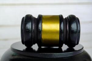 Close up of lawyer's gavel with customizable space for text. Laws and regulations concept photo