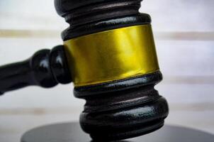 Straight up and close up of lawyer's gavel with customizable space for text. Laws and regulations concept photo