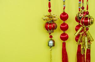 Chinese New Year decoration on yellow cover with customizable space for text. Chinese New Year celebration concept photo