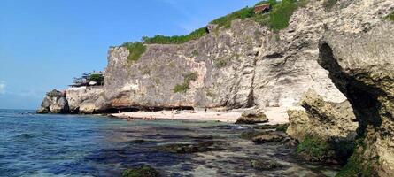 Beautiful view on suluban beach with big rocks in bali photo