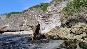Beautiful view on suluban beach with big rocks in bali photo