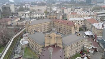 Vilnius, Lithuania 25th november, 2024 - aerial view Lukiskes Prison .The Prison complex survived both World Wars and the Soviet occupation. Historical landmark popular tourist attraction video