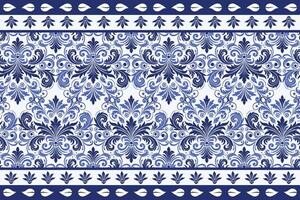 blue seamless floral pattern with delicate tulip blooms and decorative leaf accents featuring a classic border design for fabric textile background and trendy print patterns vector