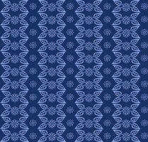 Seamless texture in the form of a pattern of leaves and flowers on a blue background vector