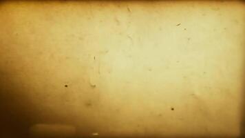 Old paper texture reveals itself, enhanced by captivating light leaks, creating a vintage and atmospheric backdrop video