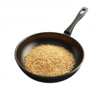 A close-up of sesame seeds in a frying pan, showcasing their texture and color. png