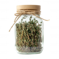 A glass jar filled with fresh thyme herbs, perfect for culinary uses and decoration. png