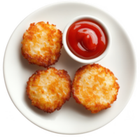 Golden fried potato croquettes served with ketchup on a round plate. png