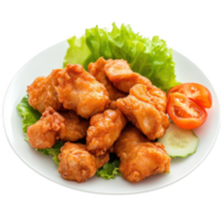 Crispy fried chicken pieces served on a bed of fresh lettuce with tomatoes. png