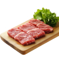 Fresh raw meat slices served with lettuce on a wooden cutting board. png
