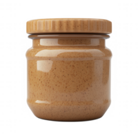 A jar of creamy and crunchy peanut butter with a wooden lid, perfect for spreads. png