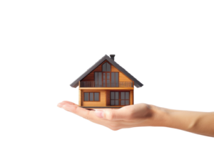 a hand holding a small house on a transparent background png