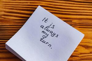Positive thoughts for increasing selfesteem on paper sticks on wooden background photo