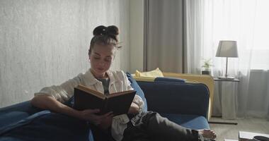 Pensive student reading book and preparing for exams video
