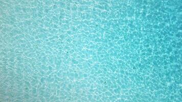 Top view of turquoise color water in tropical sea video