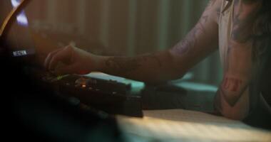 Man adjusting sound while composing music in recording studio video