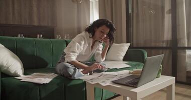 Female architect making phone call to client video